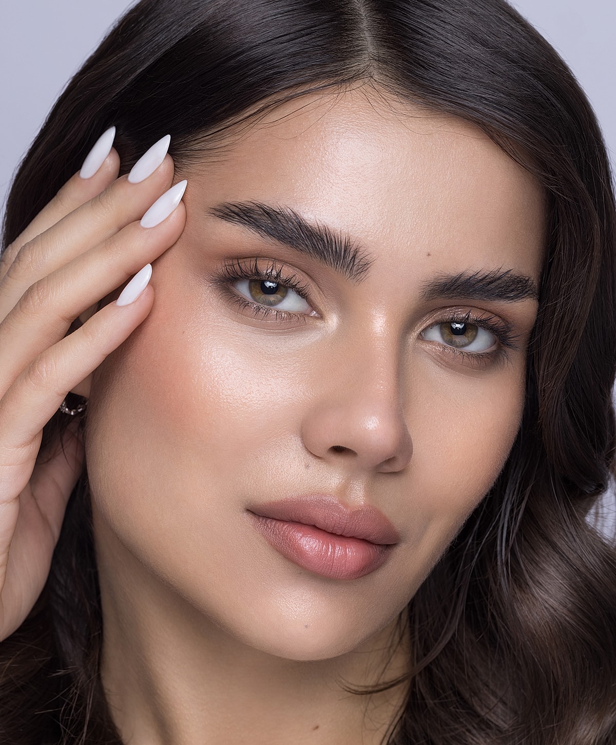 Black lace-trimmed bra with model's silhouette.