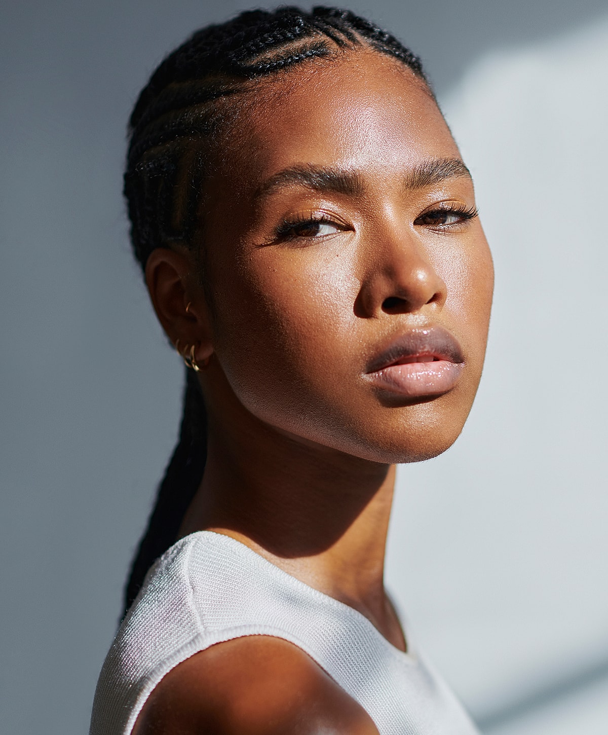 Two women engaging in conversation indoors.