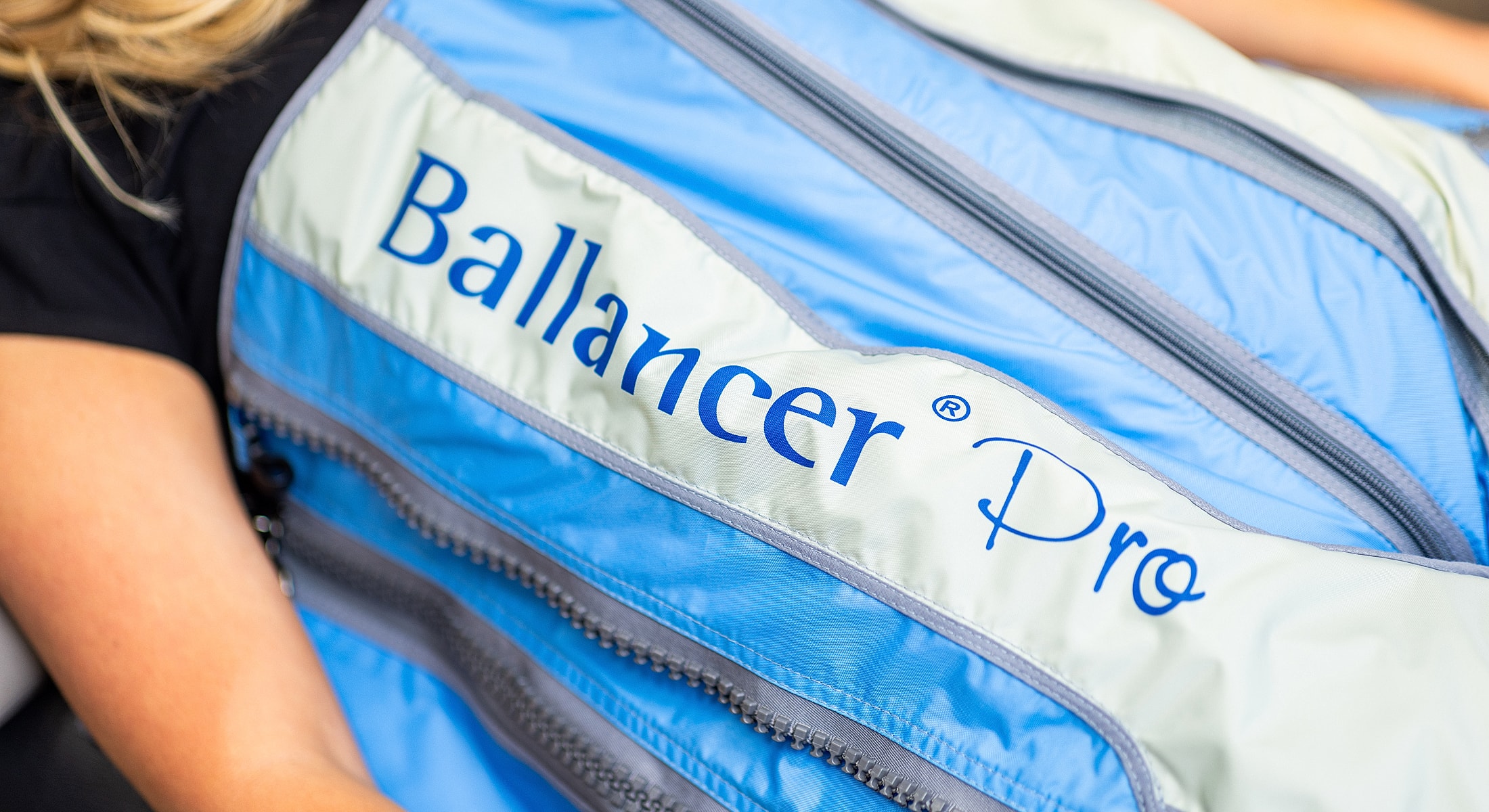 Ballancer Pro garment in blue and cream color.